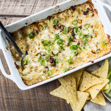 Cheesy Sundried Tomato Artichoke Dip