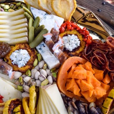 Cheese board with pistachios