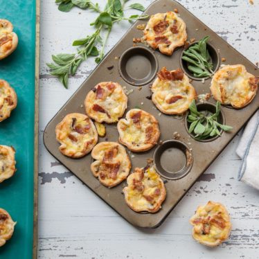 Mini Quiches with Bacon, Leek, Mushroom and Alpine-Style Cheese