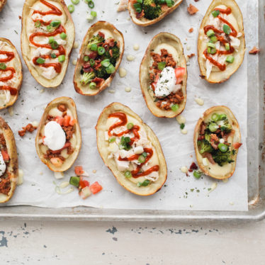 Cheesy Sriracha Chicken Potato Skins